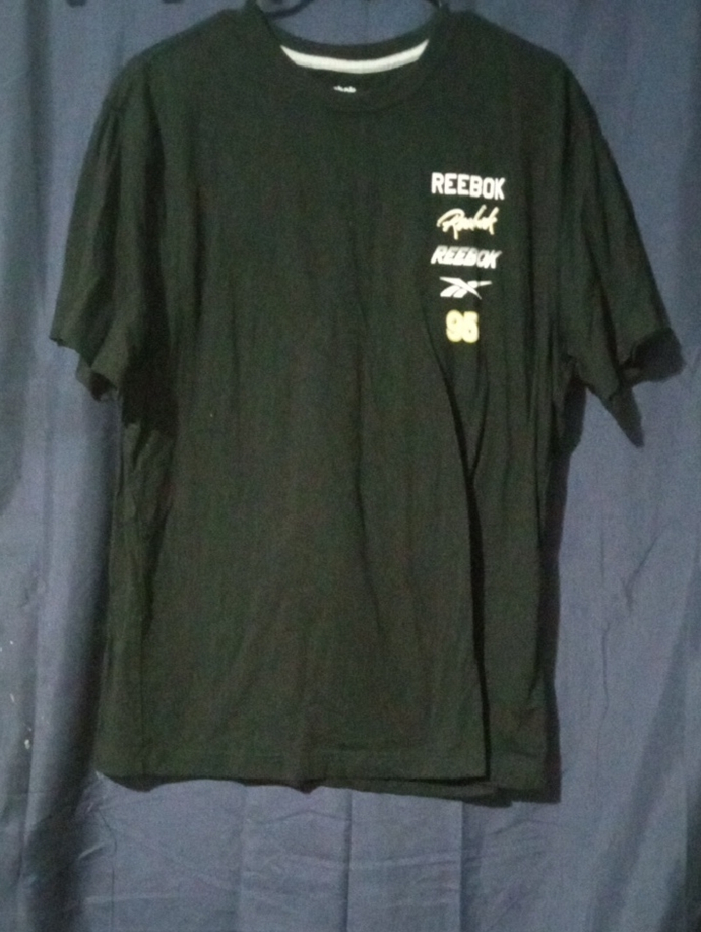 Reebok Black Short-Sleeve Logo Tee with Yellow Accent